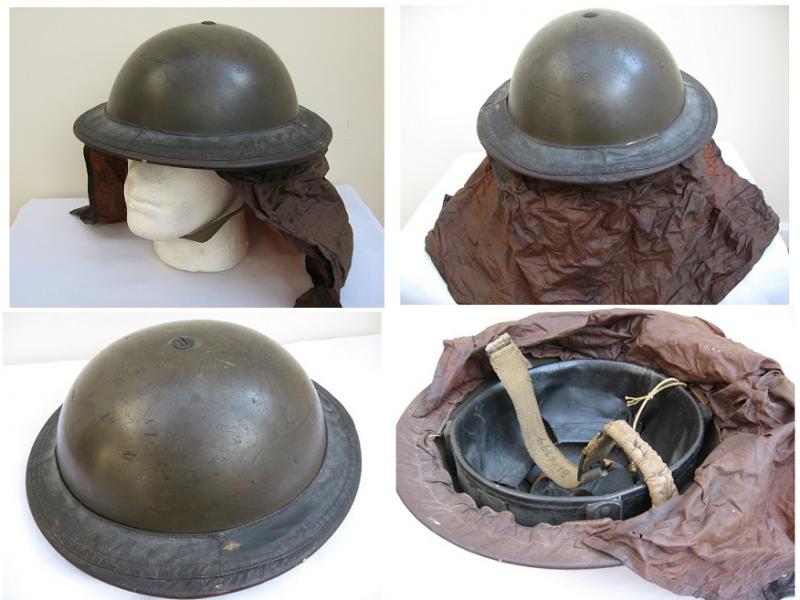 WWII British Army Steel Combat Helmet Dated 1938, and Gas Hood cover.