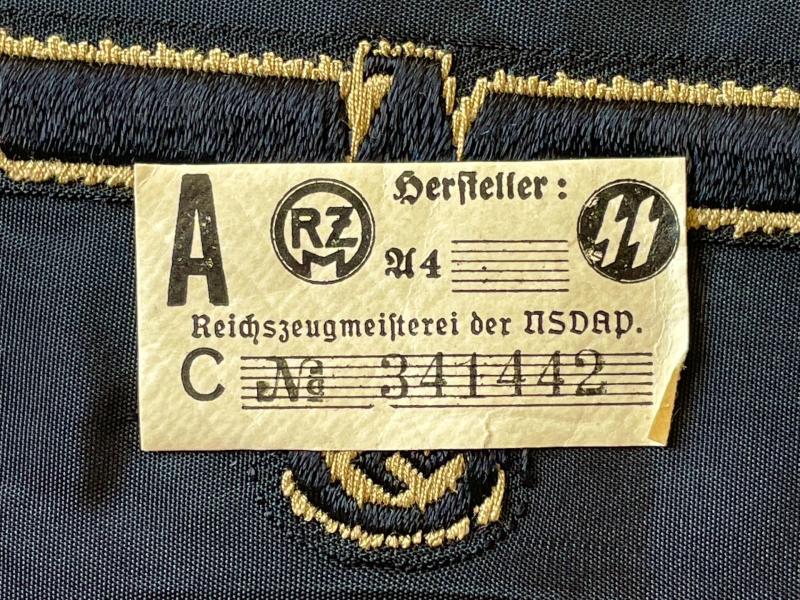 WWII GERMAN WAFFEN SS ARM EAGLE WITH SS PAPER ISSUED RZM TAG REMAINING.