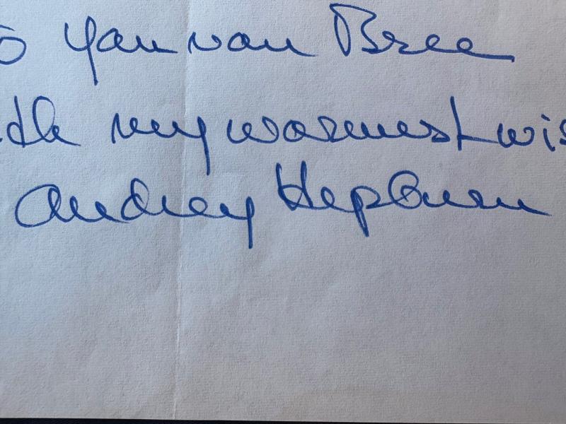 Rare Authentic Audrey Hepburn Hand Ink Signed autograph with a short inscription.