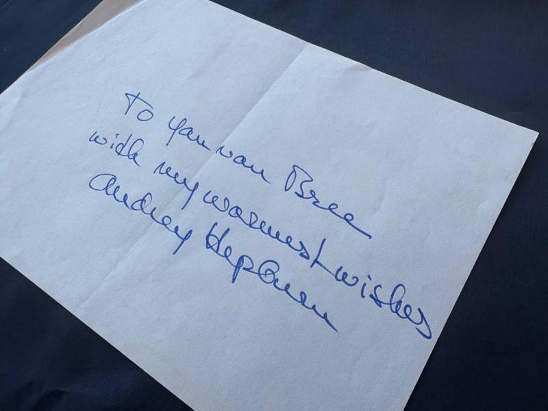 Rare Authentic Audrey Hepburn Hand Ink Signed autograph with a short inscription.