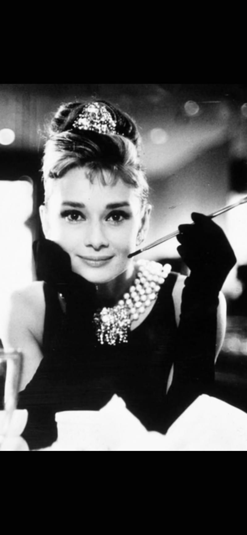 Rare Authentic Audrey Hepburn Hand Ink Signed autograph with a short inscription.